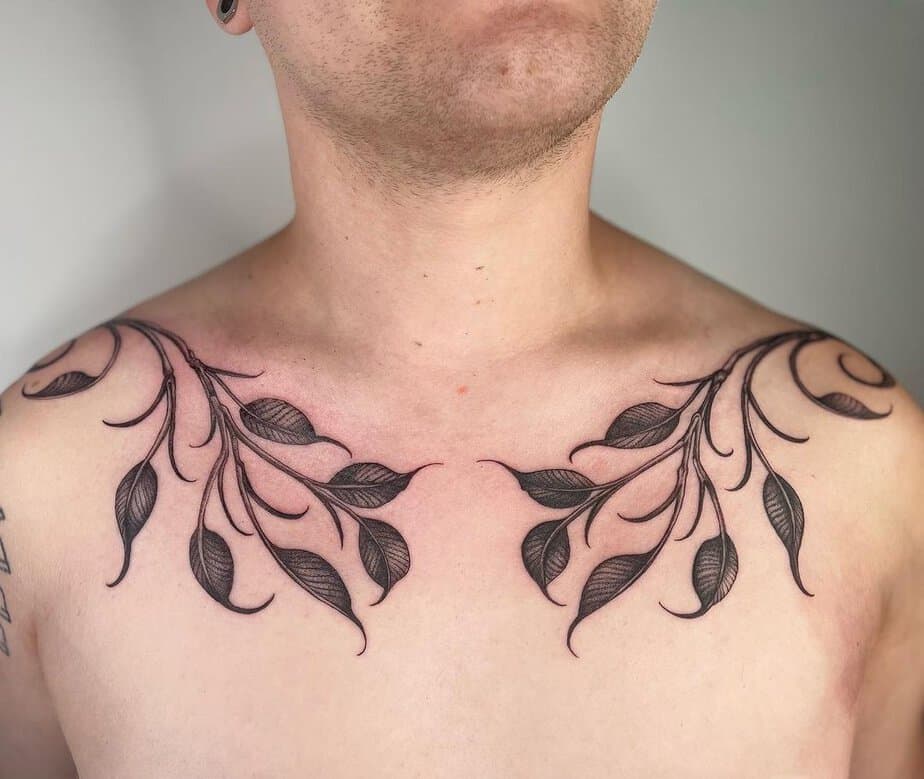 Minimalist Fine-Line Chest Tattoo with Delicate Leaf Design