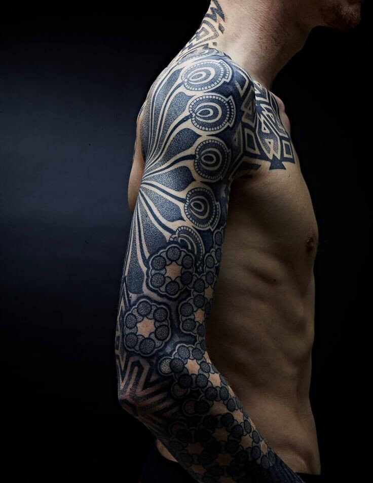 Traditional Black Tribal Sleeve Tattoo