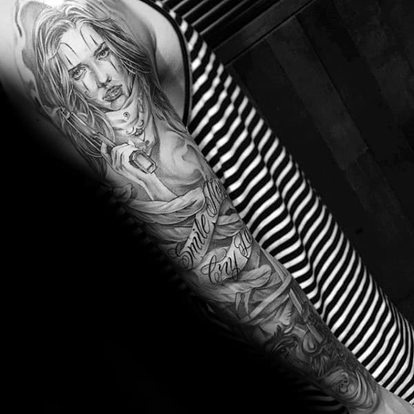 Full Sleeve Chicano Tattoo Incorporating Baroque and Street Art Influences