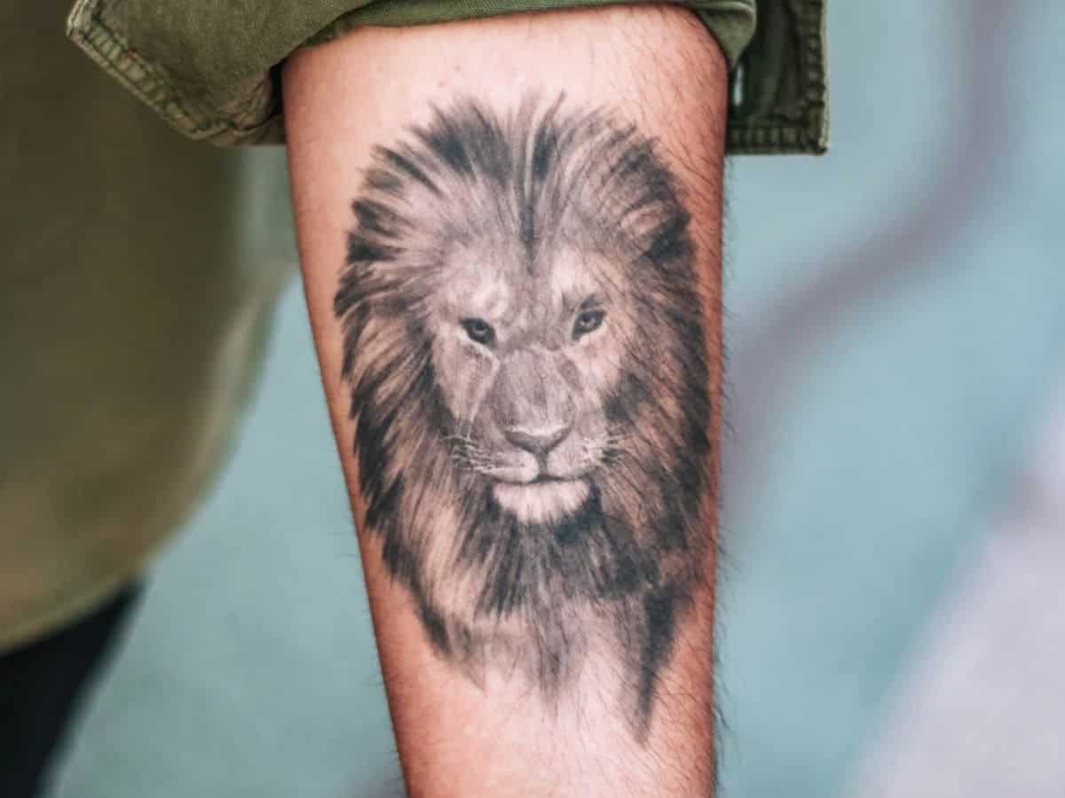 Majestic Lion Arm Tattoo