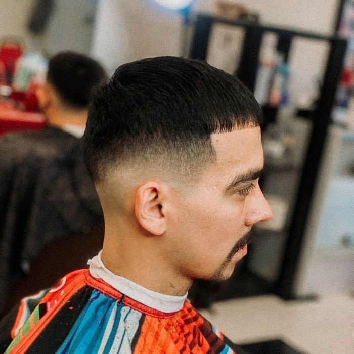 Edgar Haircut with a Crisp High Fade