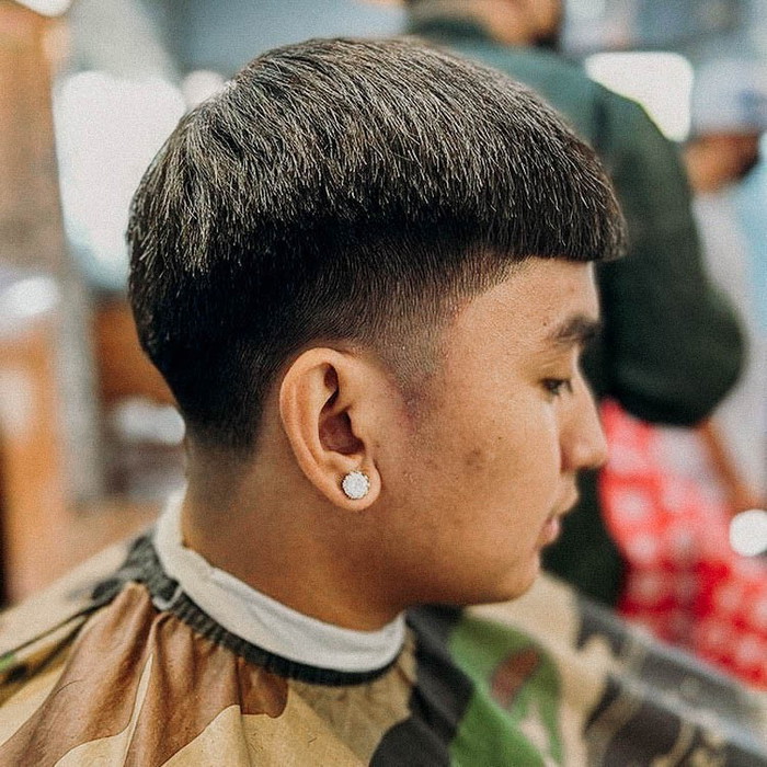 Blunt Edgar Haircut with a High-Contrast Fade