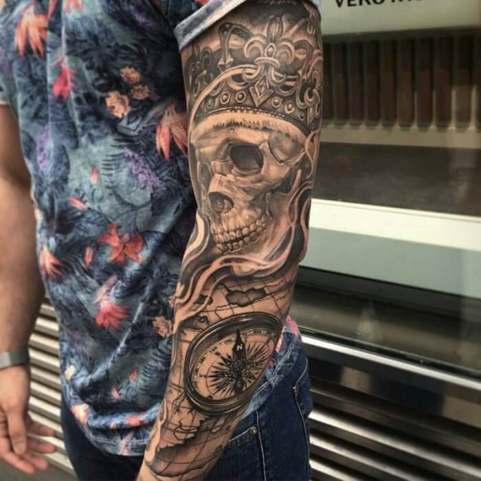 Full Sleeve Chicano Tattoo with Religious and Street Art Elements